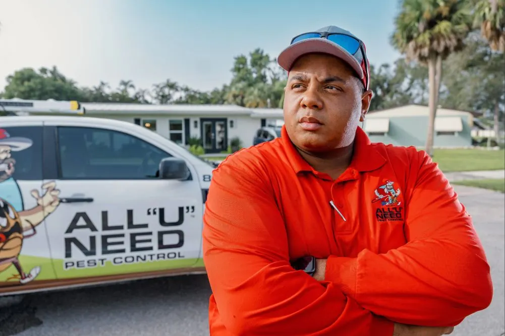 All U Need Pest Control technician standing ready to back every service with our 100% satisfaction guarantee.