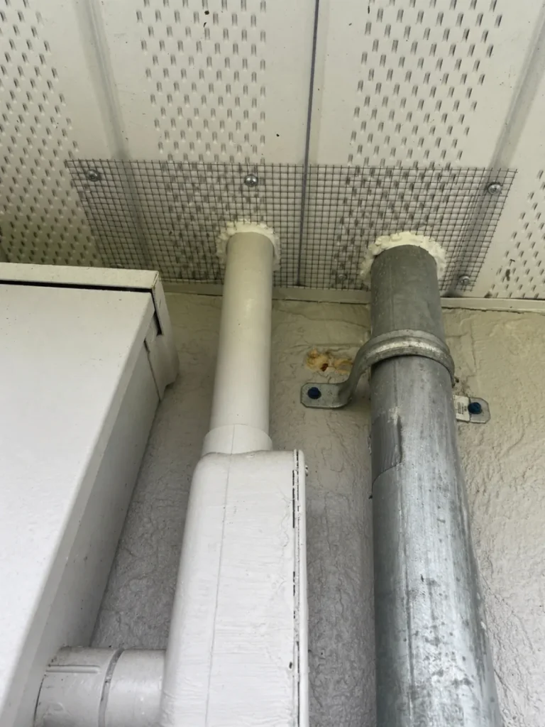 The same soffit area after our exclusion work. Gaps sealed with foam and reinforced with wire mesh so rodents can't get back in