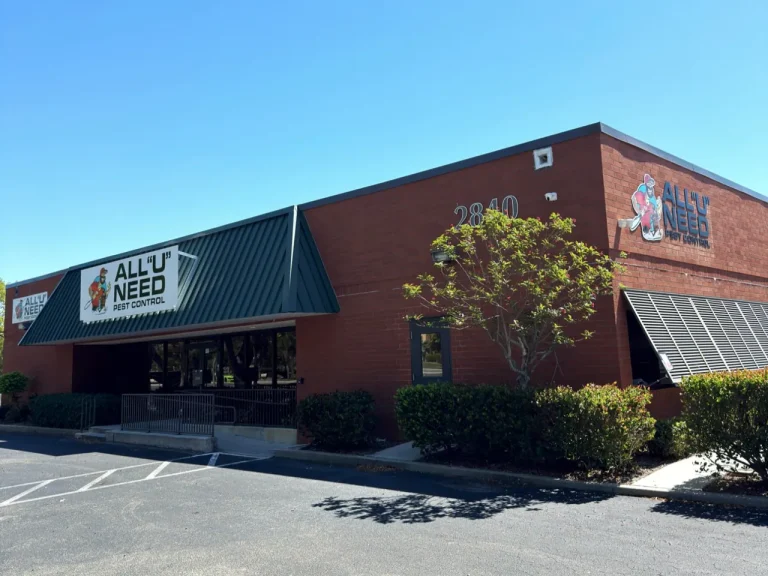 Front of the new All U Need Pest Control headquarters building with company signage